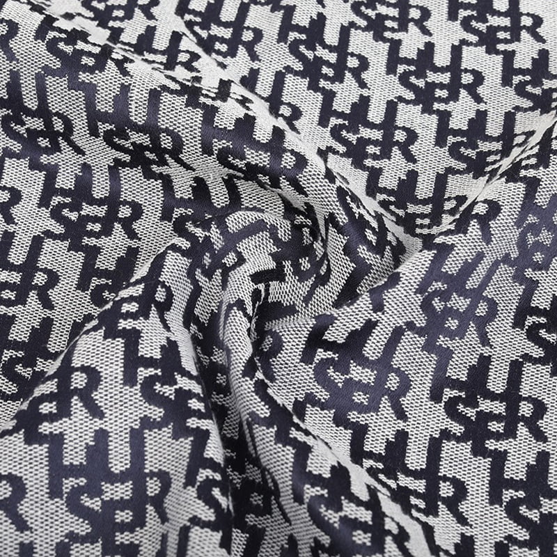 Tela Jacquard con letras grises