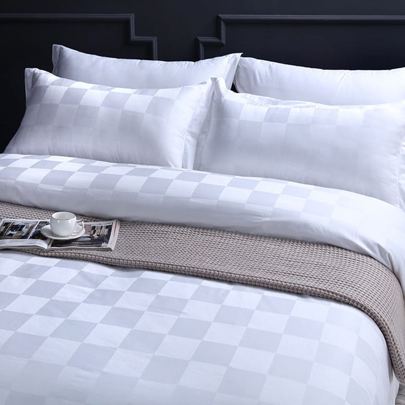 Tela de cama de hotel de rejilla cuadrada